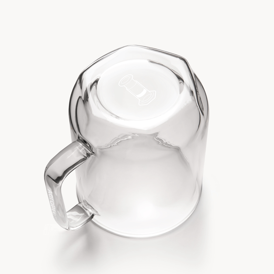 Clear glass mug on a white background