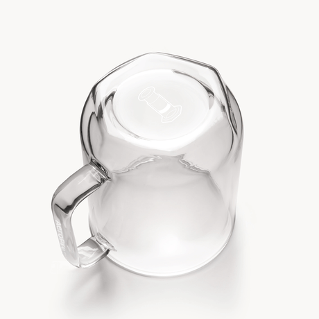 Clear glass mug on a white background