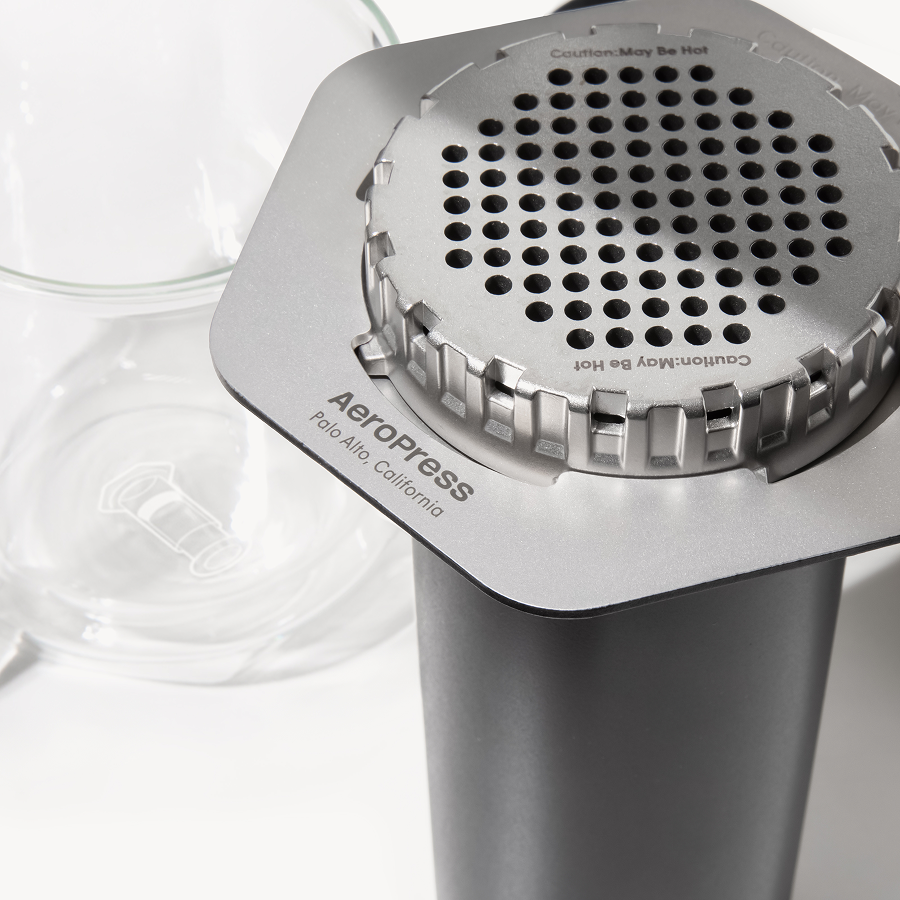 Aeropress coffee maker on a white background #color_black