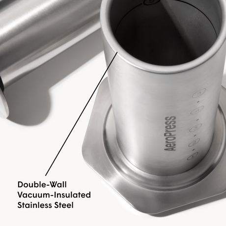 AeroPress coffee maker with double-wall vacuum-insulated stainless steel design on a white background #color_silver