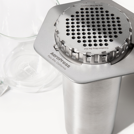 Silver AeroPress coffee maker on a white background #color_silver