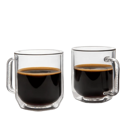 Two clear glass mugs filled with black coffee on a white background