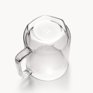 Clear glass mug on a white background