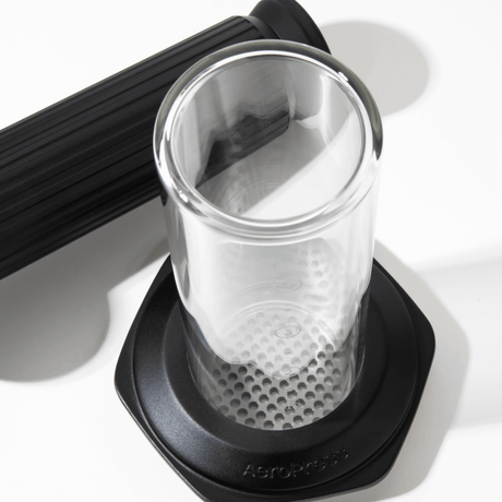 Glass AeroPress Premium coffee maker chamber on a white background #color_black
