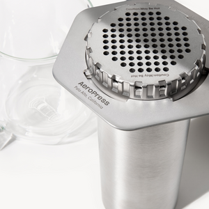 Silver AeroPress coffee maker on a white background #color_silver
